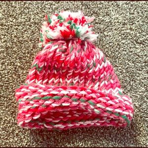 Knitted hot pink hat approx size 6-9 months